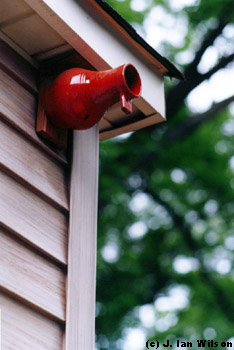 a clay birdhouse